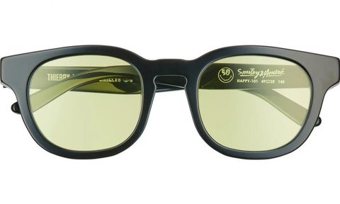 theirry lasry yellow lens glasses on a white background