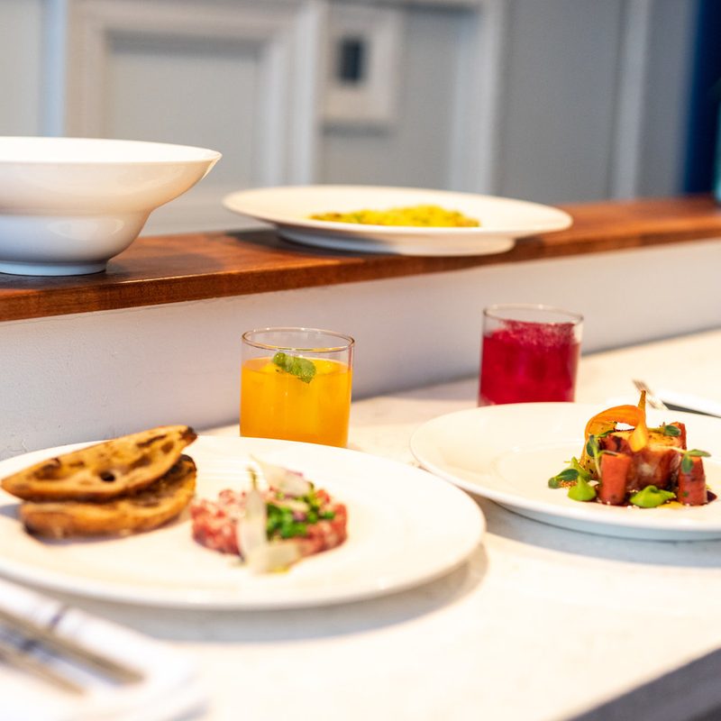 Plates on the table at Shift Kitchen + Bar