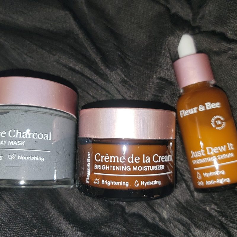 A collection of Fleur & Bee's clay mask, serum, and moisturizing cream