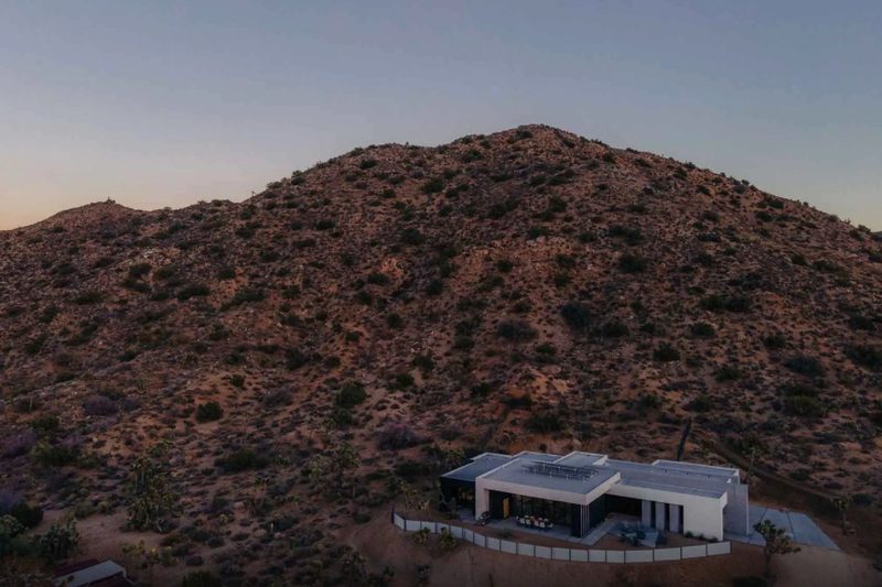 A panoramic view of The Old Man safe house tucked into the Joshua Tree hills