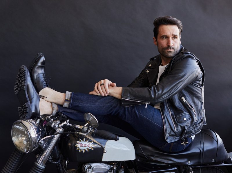 Model Luke Ditella wearing Allend Edmonds gear on motorcylce.