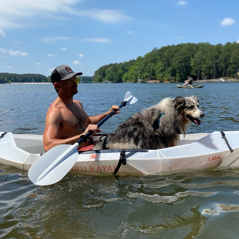 Paddling in an Oru Lake kayak with a dog