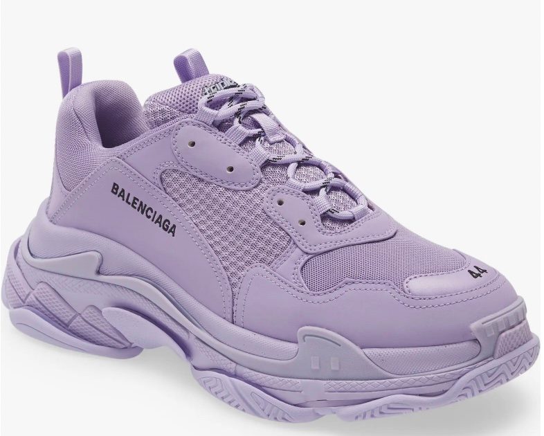 Purple Balenciaga Triple S sneaker on a white background.