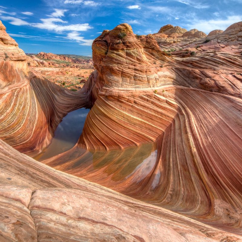 Located on the Colorado Plateau in northern Arizona, Vermilion Cliffs National Monument includes the Paria Canyon-Vermilion Cliffs Wilderness. Nationally known for its beauty, the Paria Canyon has towering walls streaked with desert varnish, huge red rock amphitheaters, sandstone arches, wooded terraces and hanging gardens.