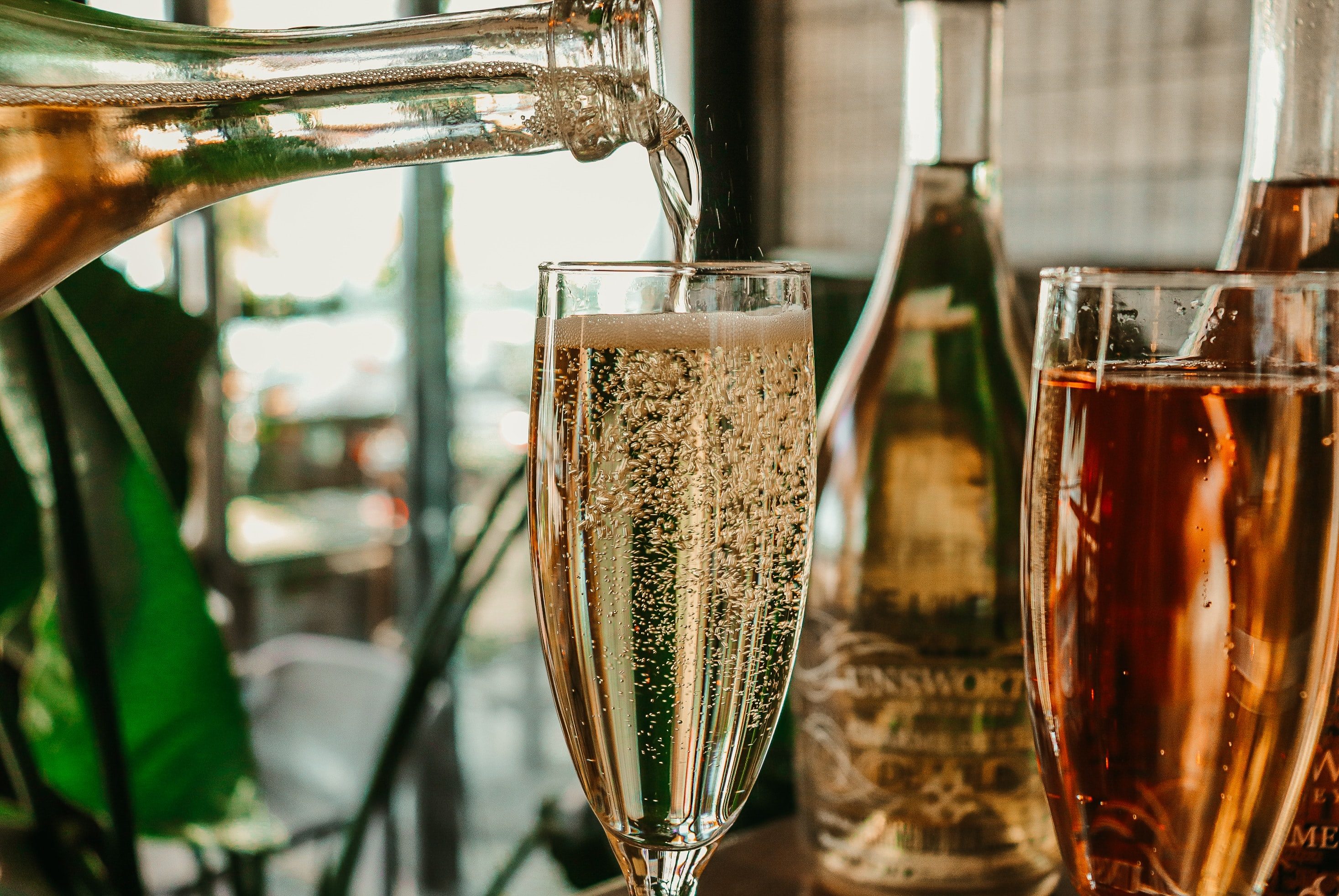 Pouring sparkling wine.