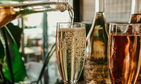 Pouring sparkling wine.