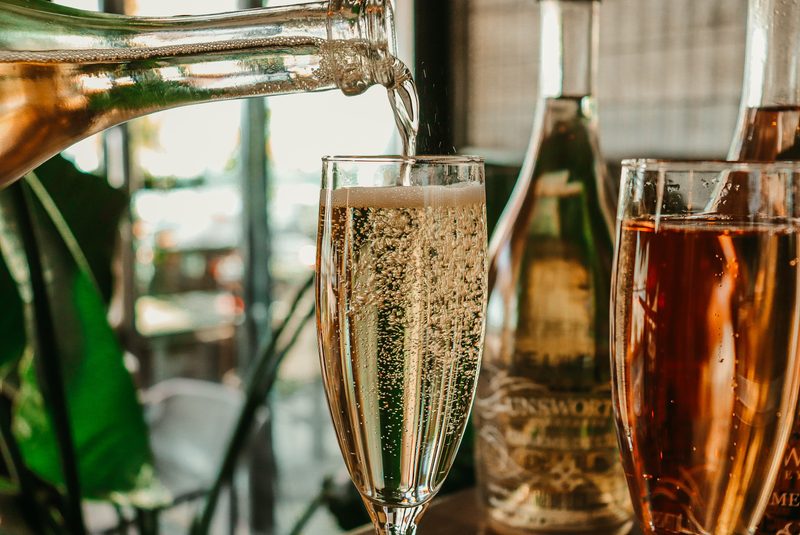 Pouring sparkling wine.