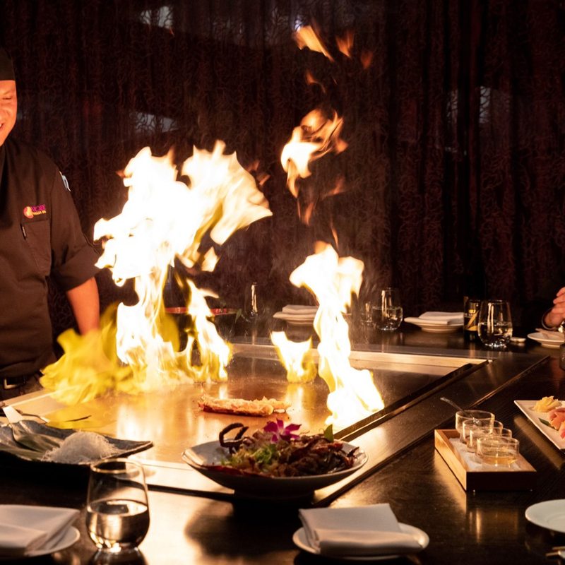 A chef cooks at a Teppan table at Nobu Las Vegas