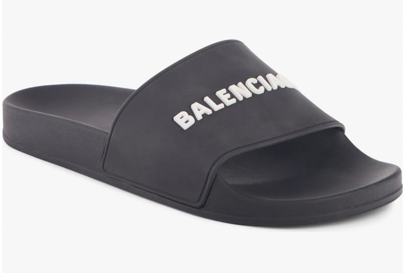 Black Balenciaga Logo slide on a white background.
