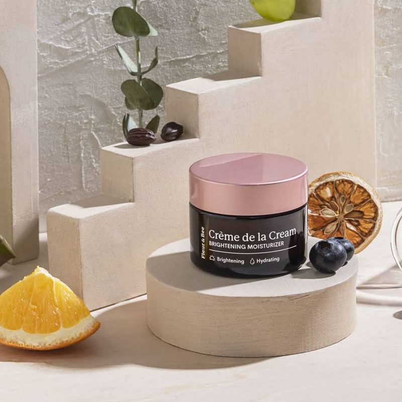 A jar of Fleur & Bee Creme de la Cream Moisturizer