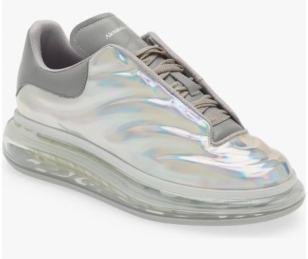 Oversized silver sneaker on a white background.