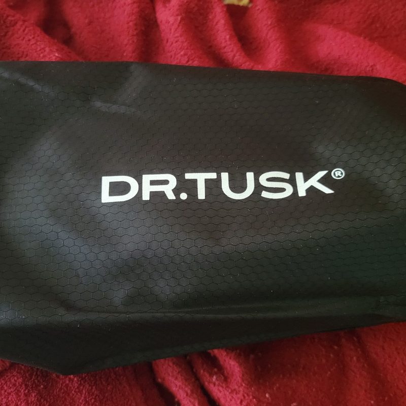 A travel bag for Dr. Tusk skincare products
