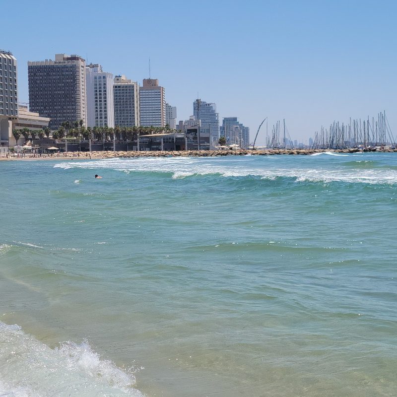 The shoreline and skyline at Hilton Beach in Tel Aviv (Israel).