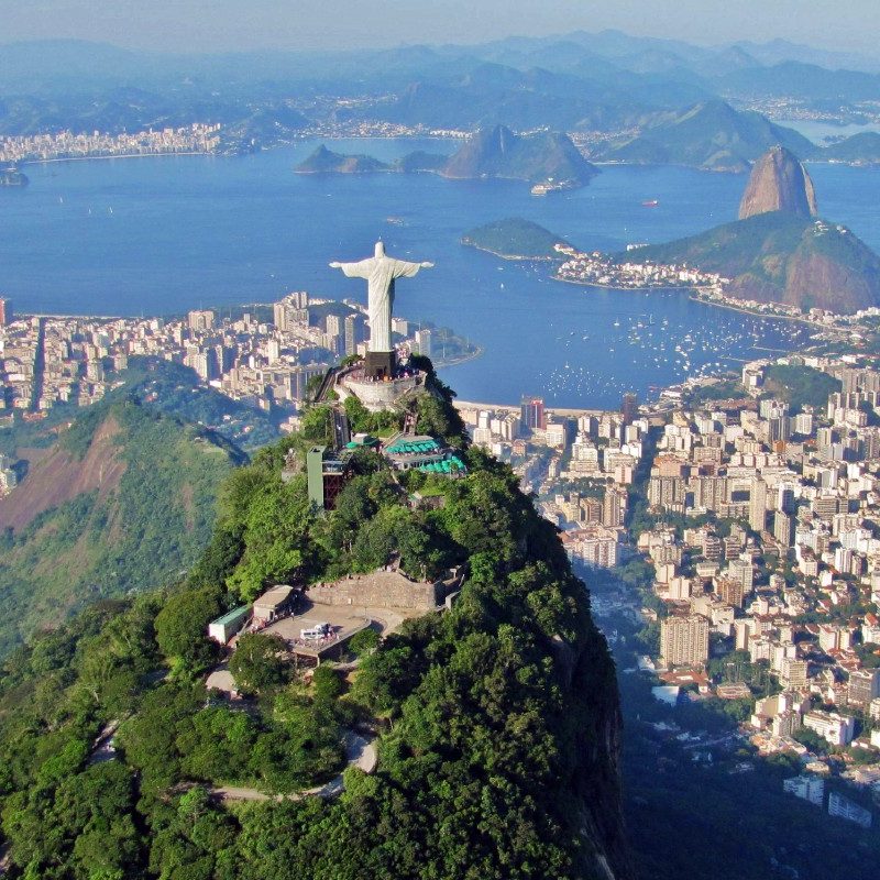 A bird's-eye view of Rio overlooking the statue of Jesus.
