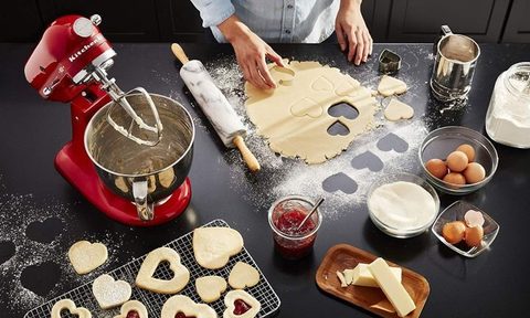 Chef using KitchenAid Stand Mixer to make heart-shaped cookies