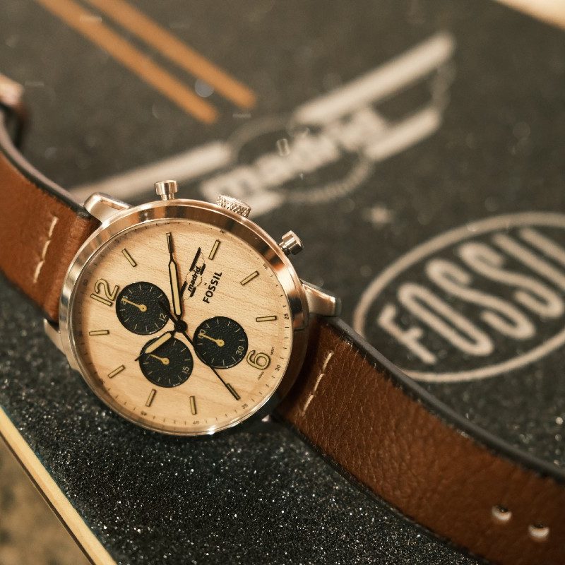 Madrid x Fossil's watch atop a skateboard