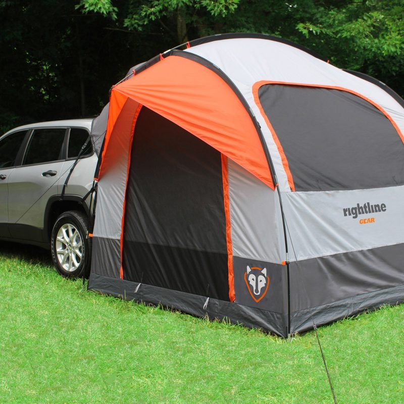 Rightline Gear SUV Tent extended on a grassy field