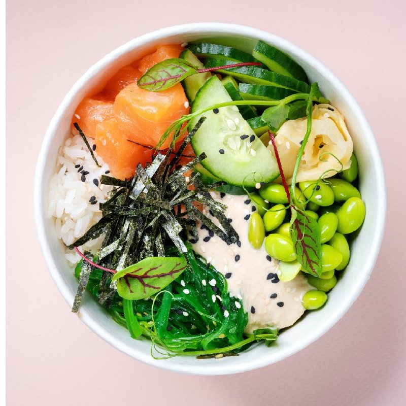 Bowl of foods high in iodine like seaweed and fish
