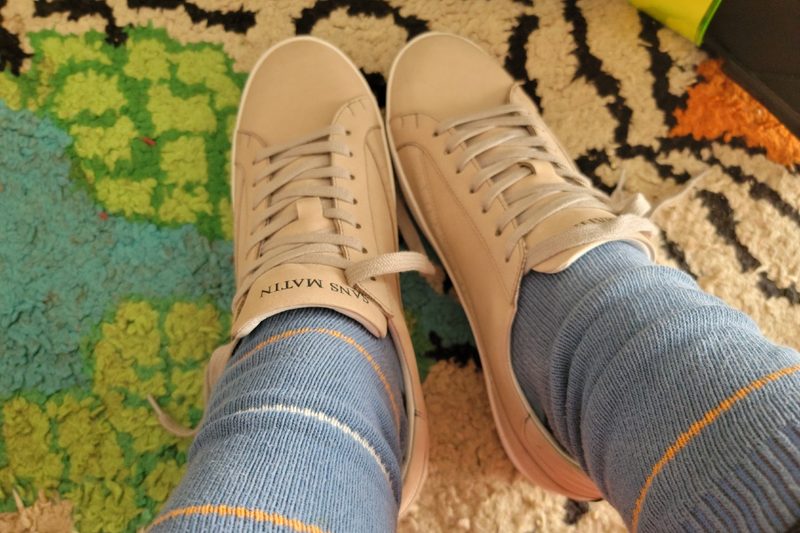 A writer models a pair of Sans Matin Eduardo shoes.