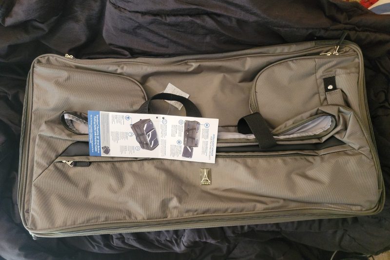 The Travelpro Roadtrip 30-inch Drop-Bottom Rolling Duffel with Packing Cubes.