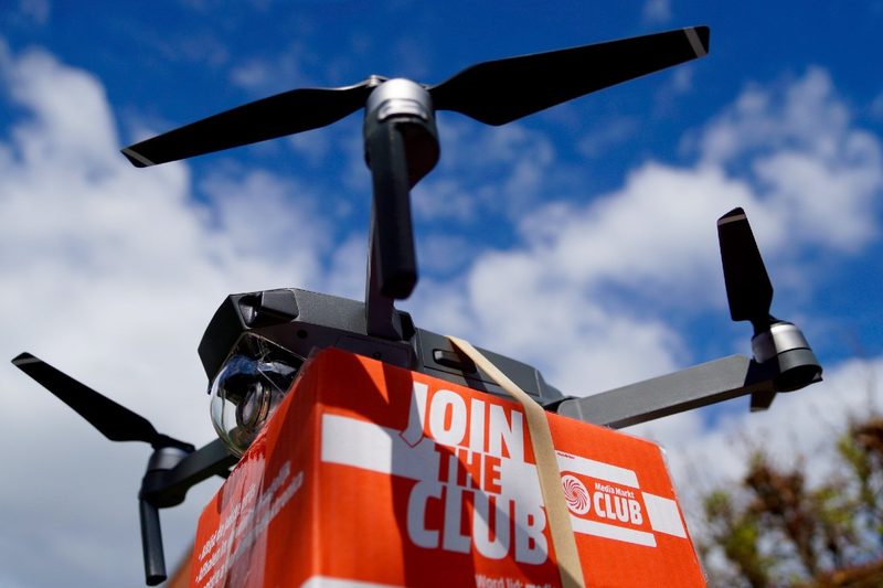 A drone delivering a package.