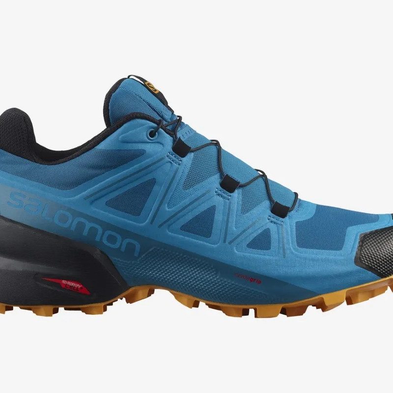 A teal Salomon Speedcross 5 trail running shoe.