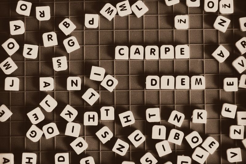 Carpe Diem spelled out with letter tiles.