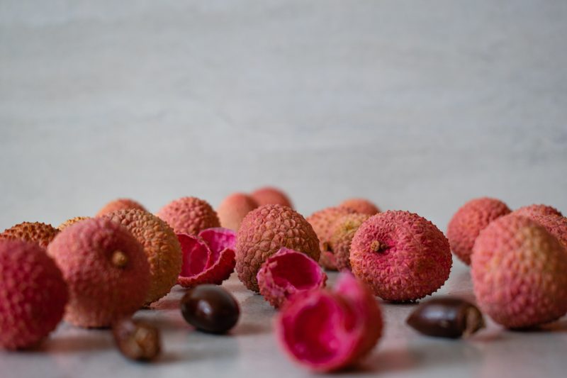 lychee with gray background.