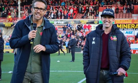 Ryan Reynolds (left) and Rob McElhenney introducing themselves to Wrexham at the home stadium.