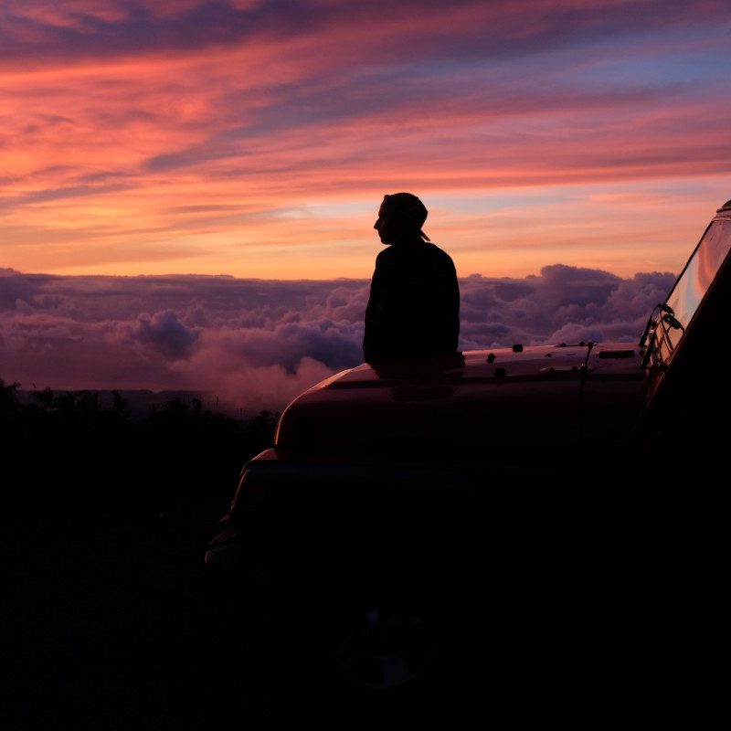 A guy in the dusk on the road