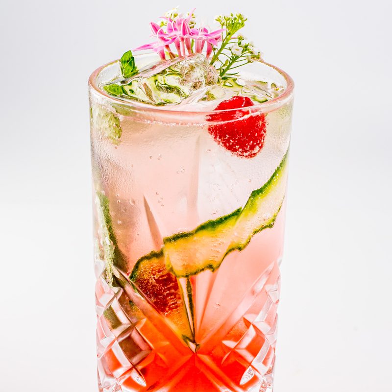 A close up of a Pretty in Pink cocktail.