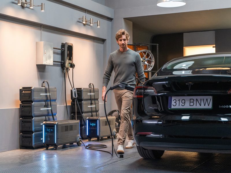 Zendure being used to charge EV vehicle with batteries attached in garage.