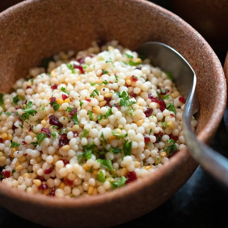 Couscous in a wooden bowl