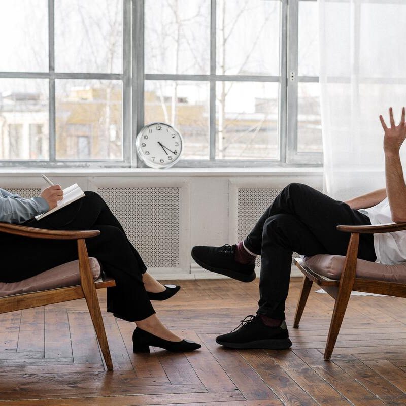 Man talking to therapist.