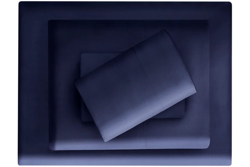 A portrait of My Sheets Rock Navy Regulator bed sheets.