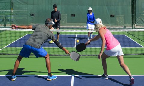Group playing pickleball