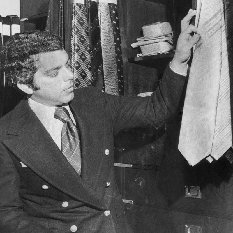 Ralph Lauren displaying his tie collection in 1970.