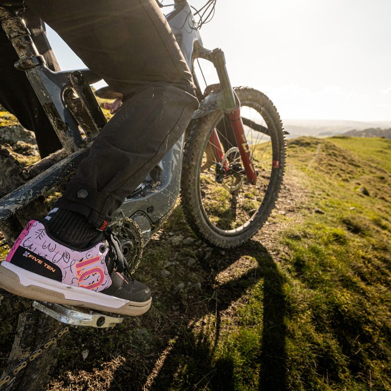 Riding a mountain bike in the Five Ten Freerider Pro BCA shoes.