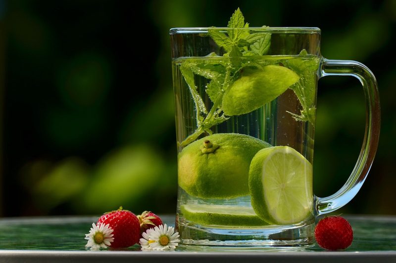 Glass of water with limes.