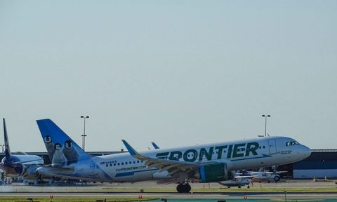 Frontier airplane at an airport.