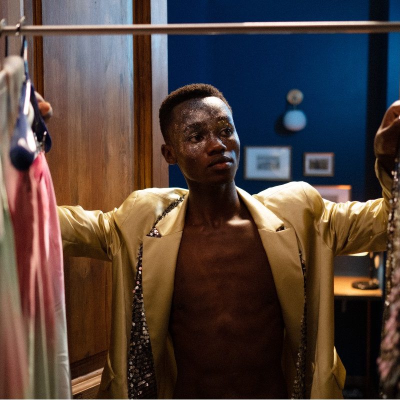 Man looking in his closet
