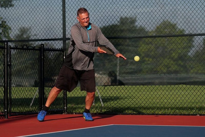 A person playing pickleball.