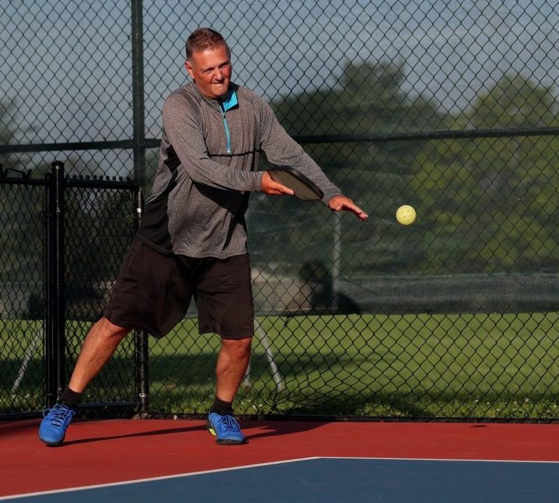 A person playing pickleball