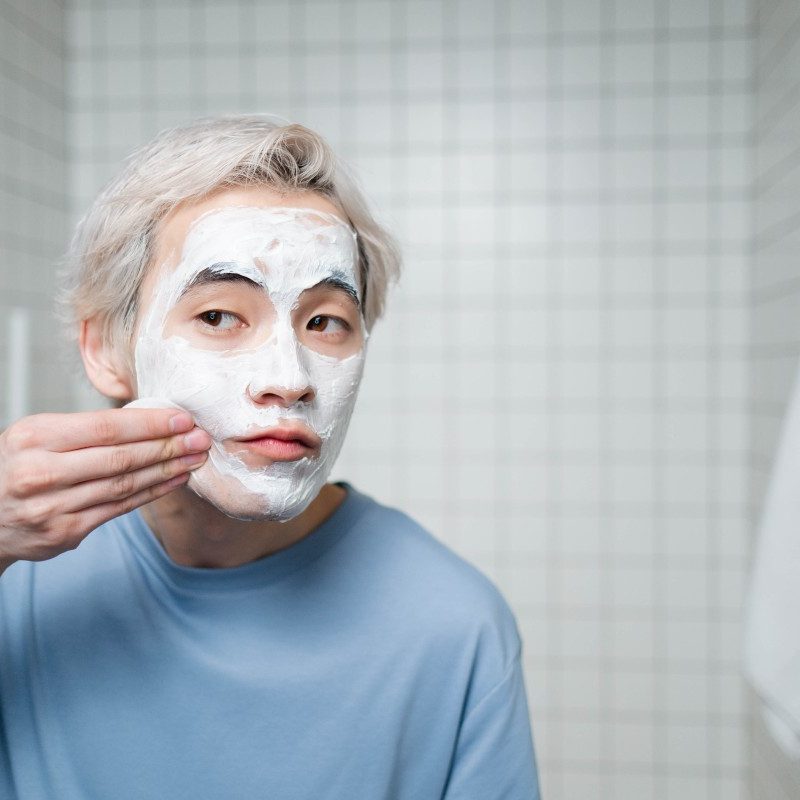 Man with facial cream