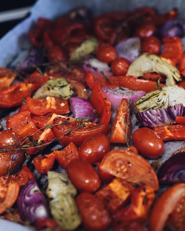 Roasted vegetables on a baking sheet