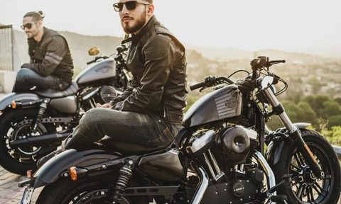 Guy in leathers on a motorcycle