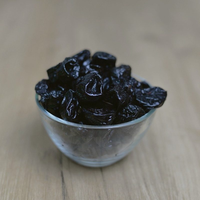 Dried prunes in a bowl