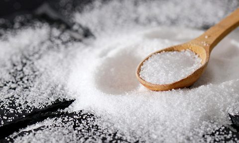Salt with a wooden spoon