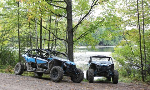 Traveling Wisconsin off road trails in Can Am side by sides.