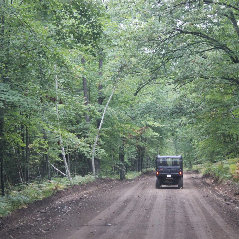 Exploring backcountry roads in a Polaris General UTV.